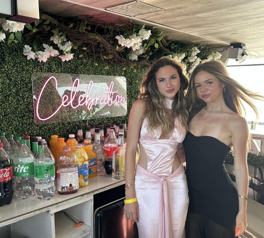 Guests at the Celebration neon bar